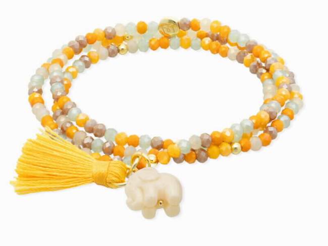 Pulsera ZEN MOSTAZA con elefante de Marina Garcia Joyas en plata Pulsera de plata de primera ley (925) chapada en oro amarillo de 18kt, con nucleo de silicona elástica y cristal de strass facetado, con elefante en resina. Talla grande de 18 cm. (54 cm. total)