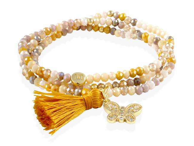 Pulsera ZEN PIEDRA con mariposa de Marina Garcia Joyas en plata Pulsera de plata de primera ley (925) chapada en oro amarillo de 18kt, con nucleo de silicona elástica y cristal de strass facetado, con charm mariposa. Talla media de 17 cm. (51 cm. total)